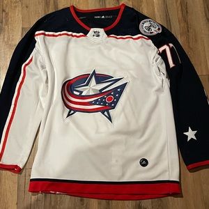 Sports jerseys, plus one autographed jersey